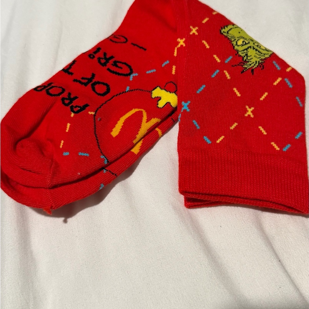 McDonald's Grinch Meal Socks with Yellow Logo and Multicolor Sprinkles